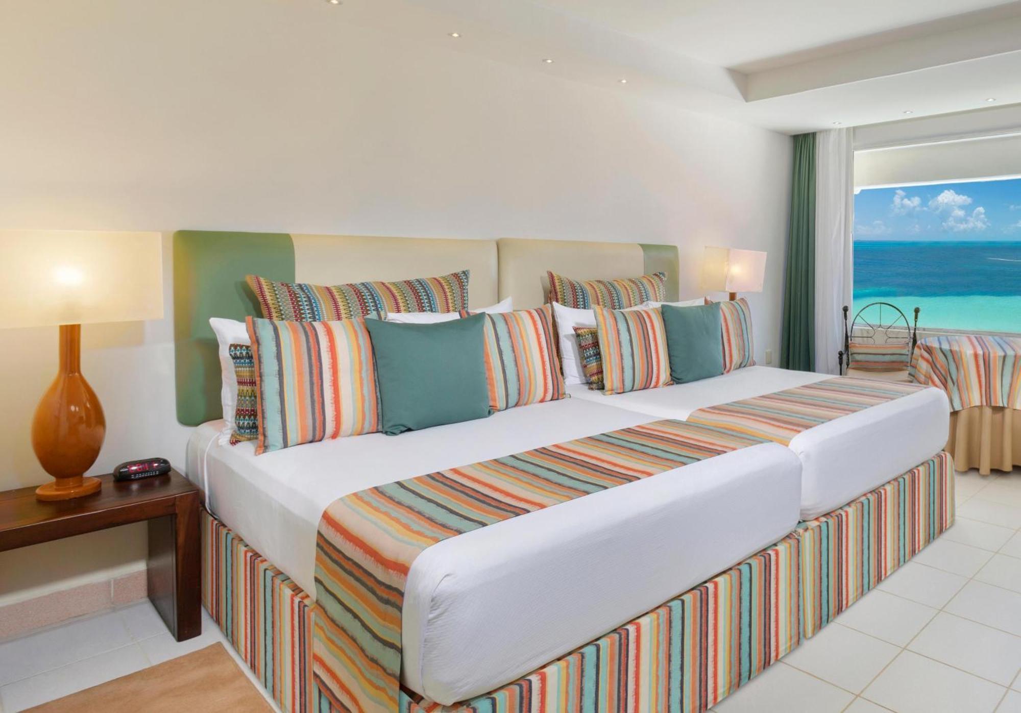 แกรนด์ โอเอซิส ปาล์ม ออล อินคลูซีฟ Hotel แคนคูน ภายนอก รูปภาพ A bedroom at the Iberostar Grand Hotel Bávaro